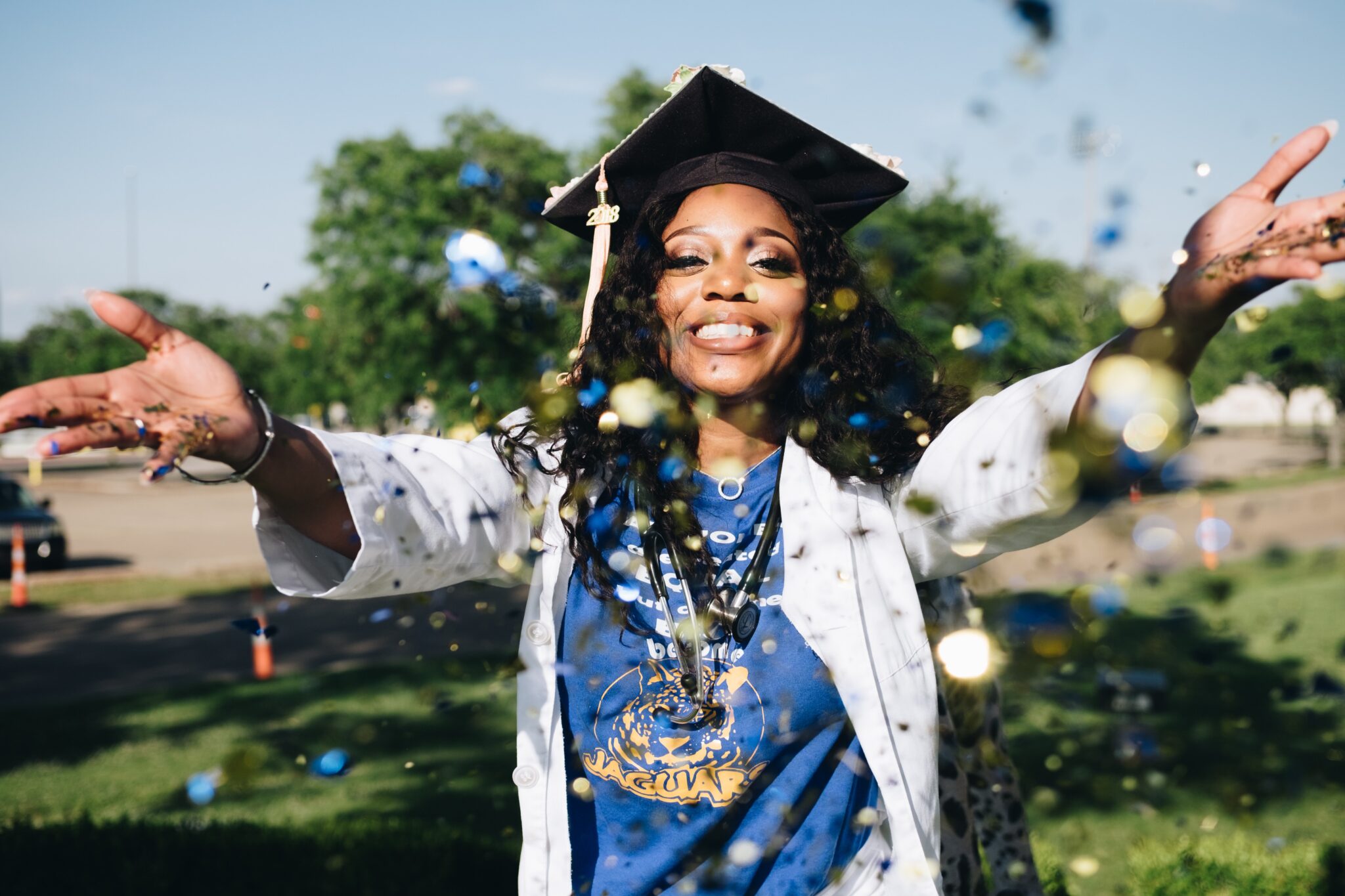 African American Woman Graduate happy